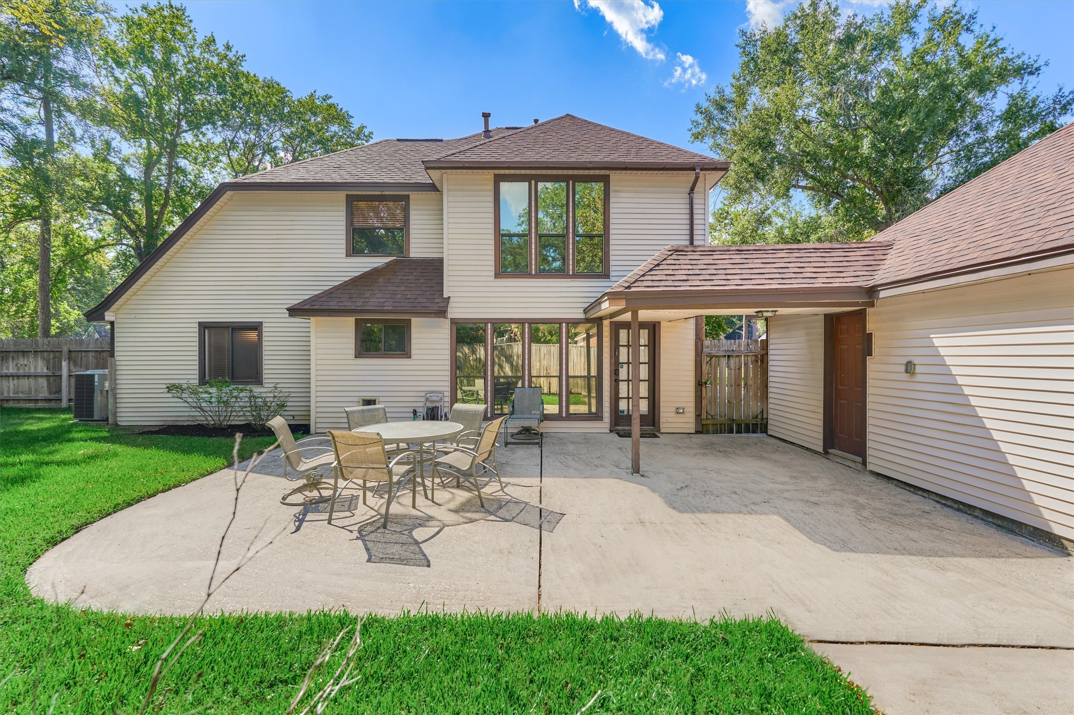 25706 Overlake Drive Spring, TX 77380 - Photo 29 of 32 Another view of the expansive patio perfect for outdoor entertaining.
