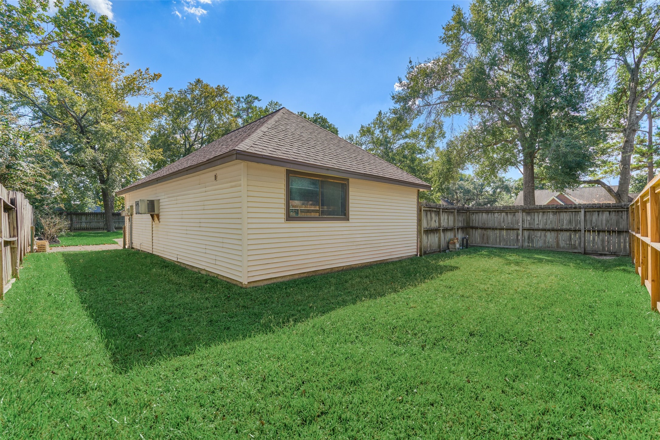 25706 Overlake Drive Spring, TX 77380 - Photo 31 of 32 spacious lawn behind detached garage
