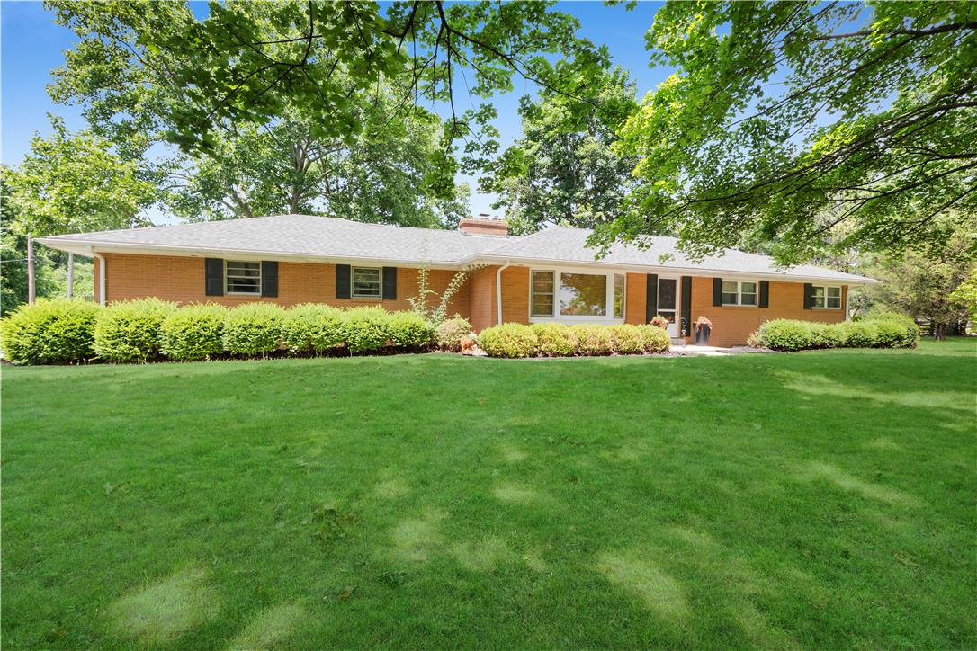 5747 Kernsville Road Orefield, PA 18069 - Photo 3 of 56 a view of a house with a backyard and a patio