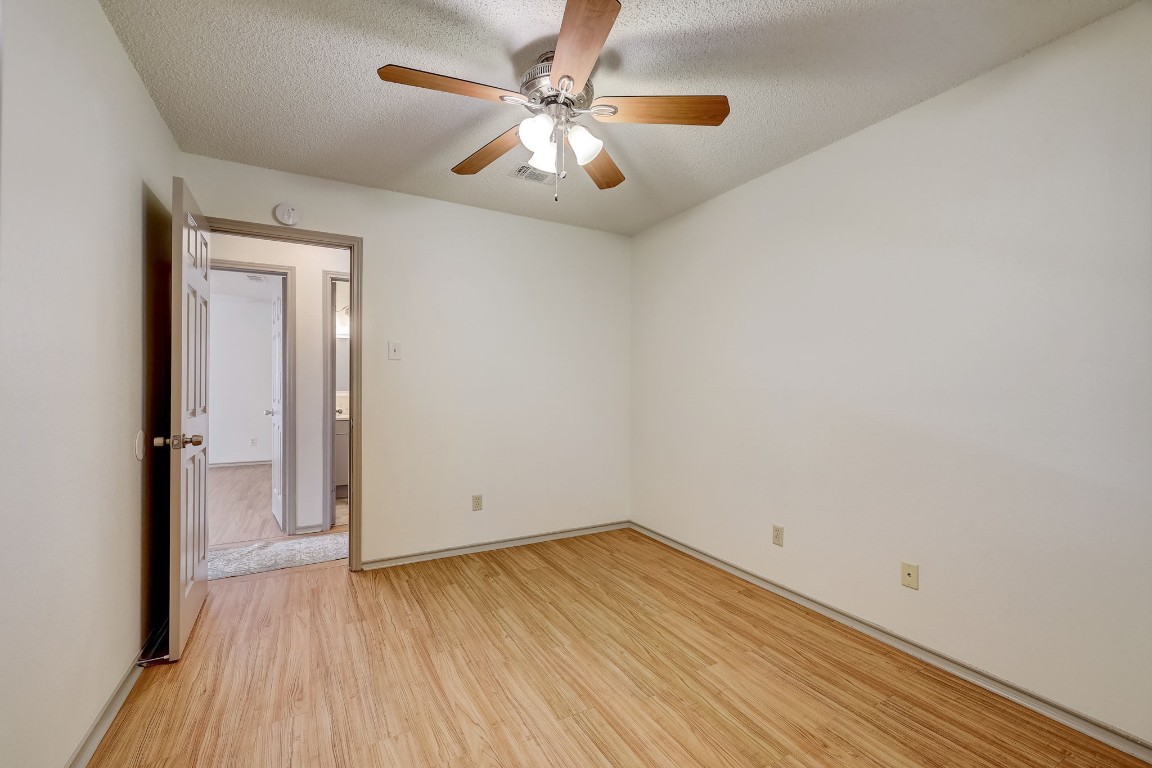 1709 Goodson Lane Round Rock, TX 78664 - Photo 18 of 37 wooden floor in an empty room