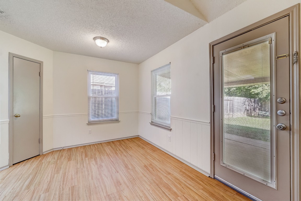 1709 Goodson Lane Round Rock, TX 78664 - Photo 9 of 37 a view of empty room with wooden floor and fan