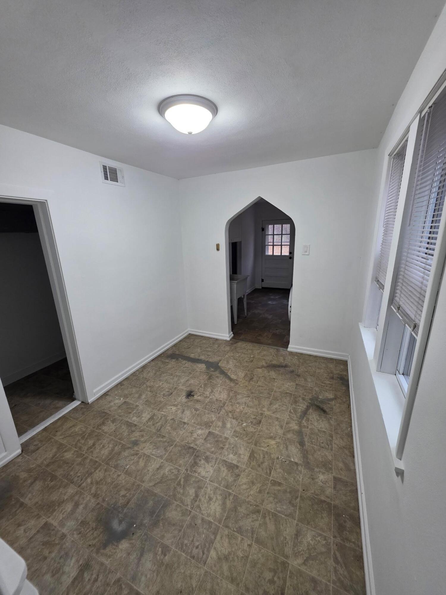 1033 Reder Road Griffith, IN 46319 - Photo 18 of 20 a view of a hallway to a house with stairs