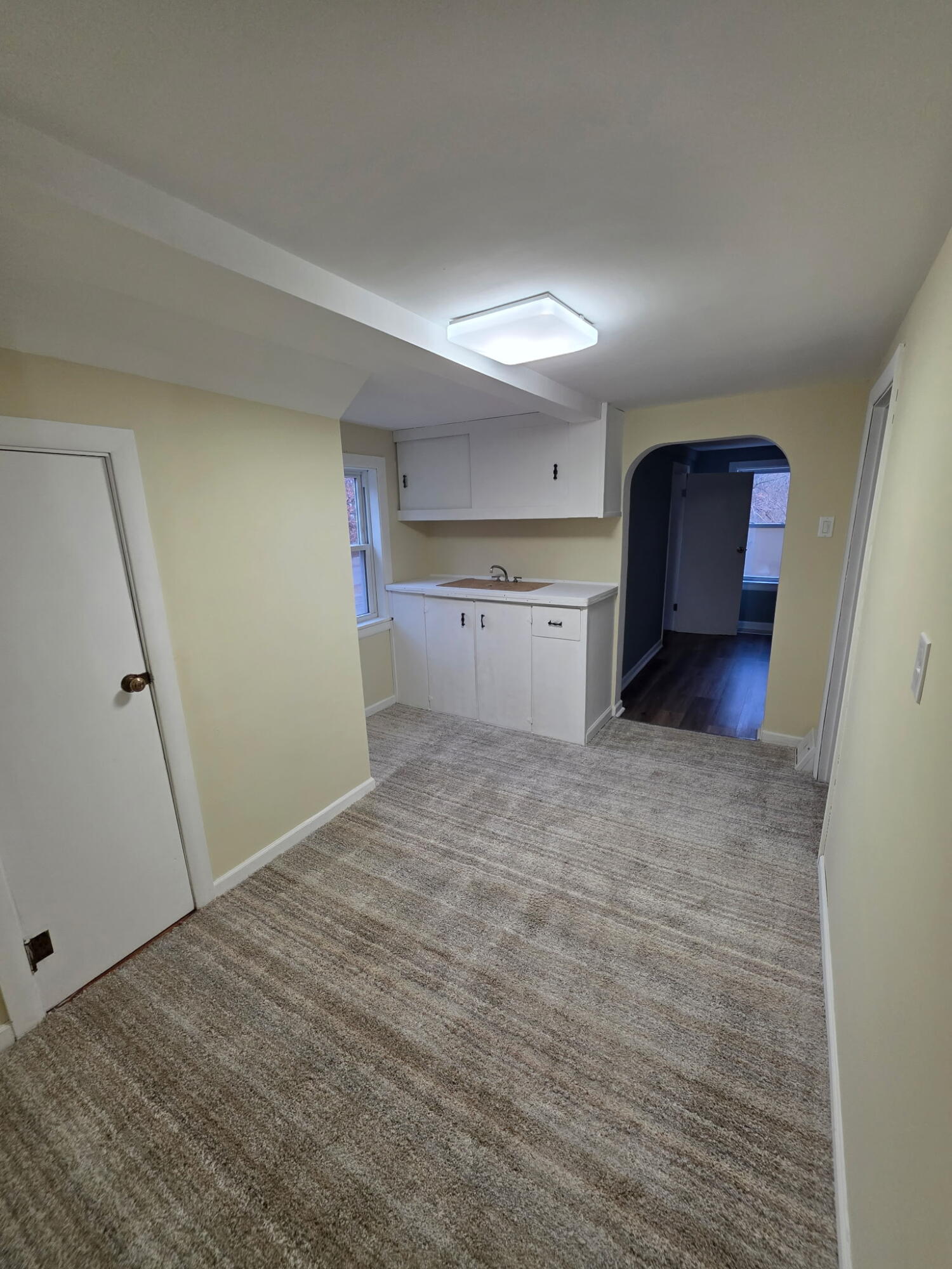 1033 Reder Road Griffith, IN 46319 - Photo 7 of 20 a view of a kitchen with a sink and cabinets