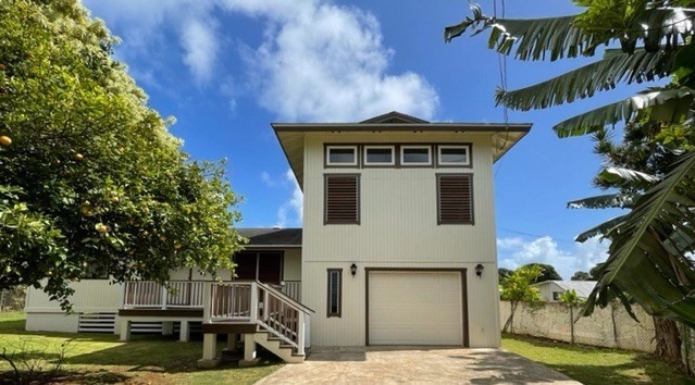 178 Eggerking Road Kapaa, HI 96746 - Photo 1 of 9 a front view of a house with garden