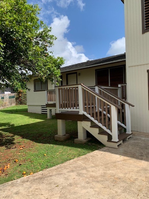 178 Eggerking Road Kapaa, HI 96746 - Photo 3 of 9 a view of house with a deck front of house