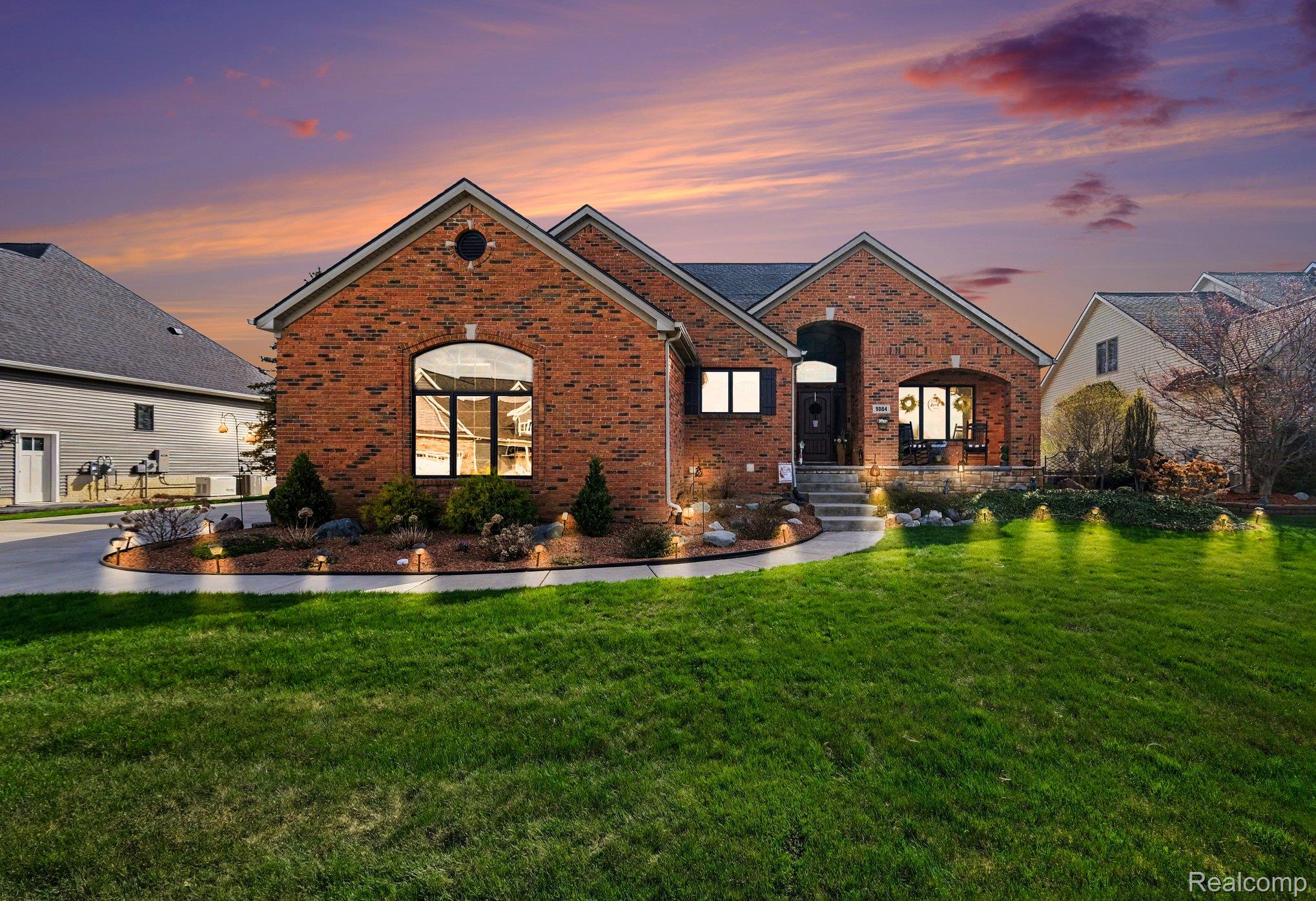 9084 Copper Ridge Drive Davison, MI 48423 - Photo 39 of 42 View of front of home featuring brick siding and a front lawn