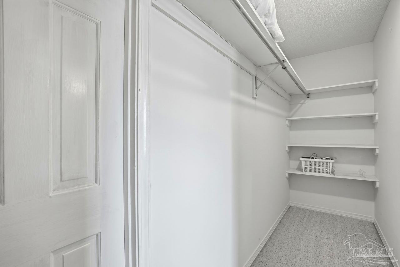 1437 Kings Road Cantonment, FL 32533 - Photo 47 of 67 a view of an empty walk in closet