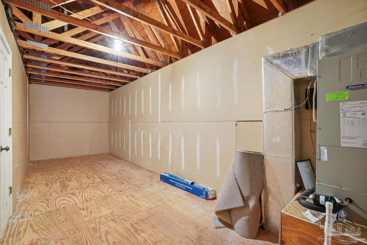 1437 Kings Road Cantonment, FL 32533 - Photo 50 of 67 Attic storage through upstairs bedroom closet.