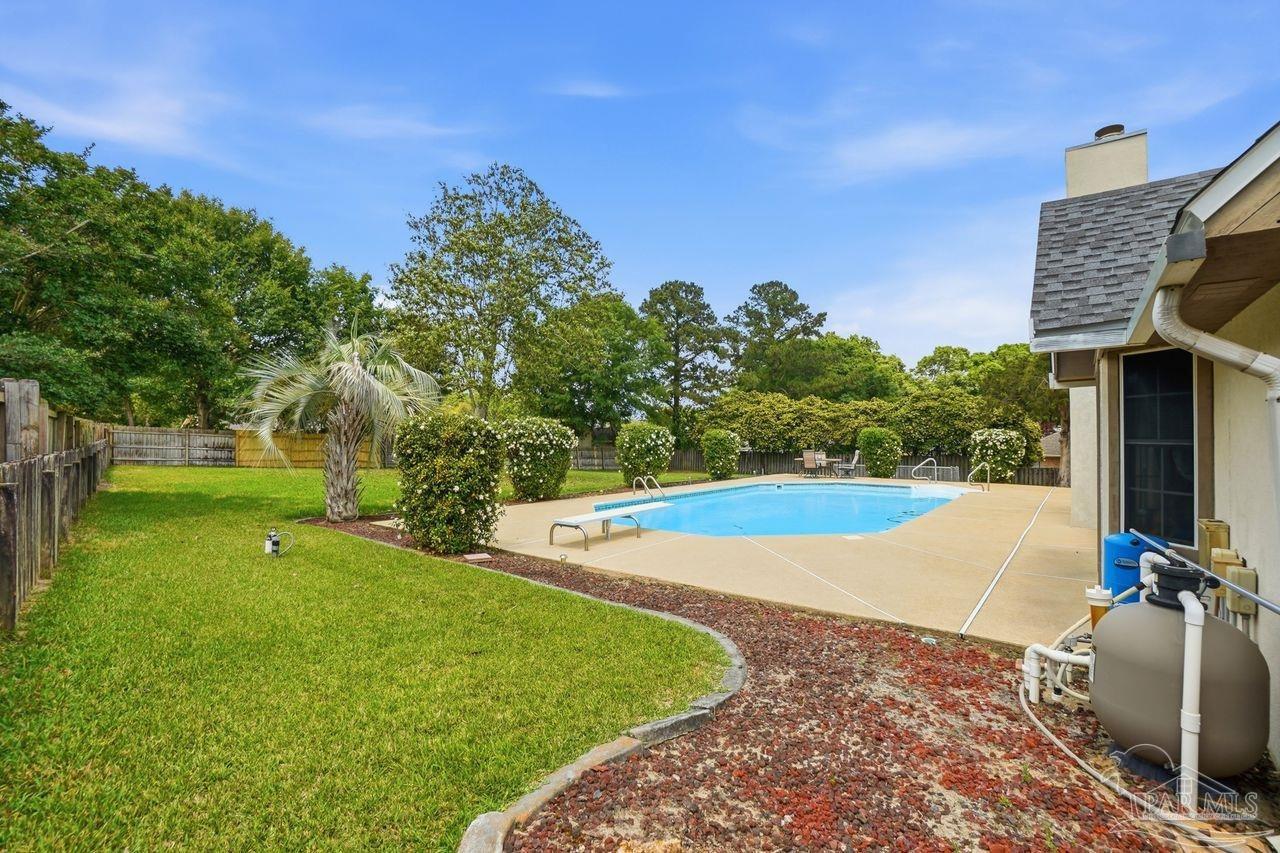 1437 Kings Road Cantonment, FL 32533 - Photo 62 of 67 a view of a backyard