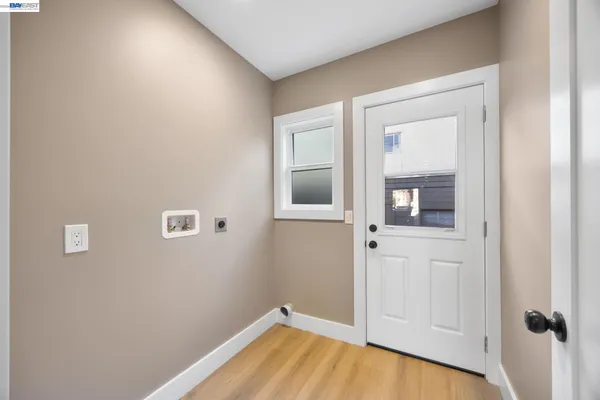 a view of a livingroom with wooden floor