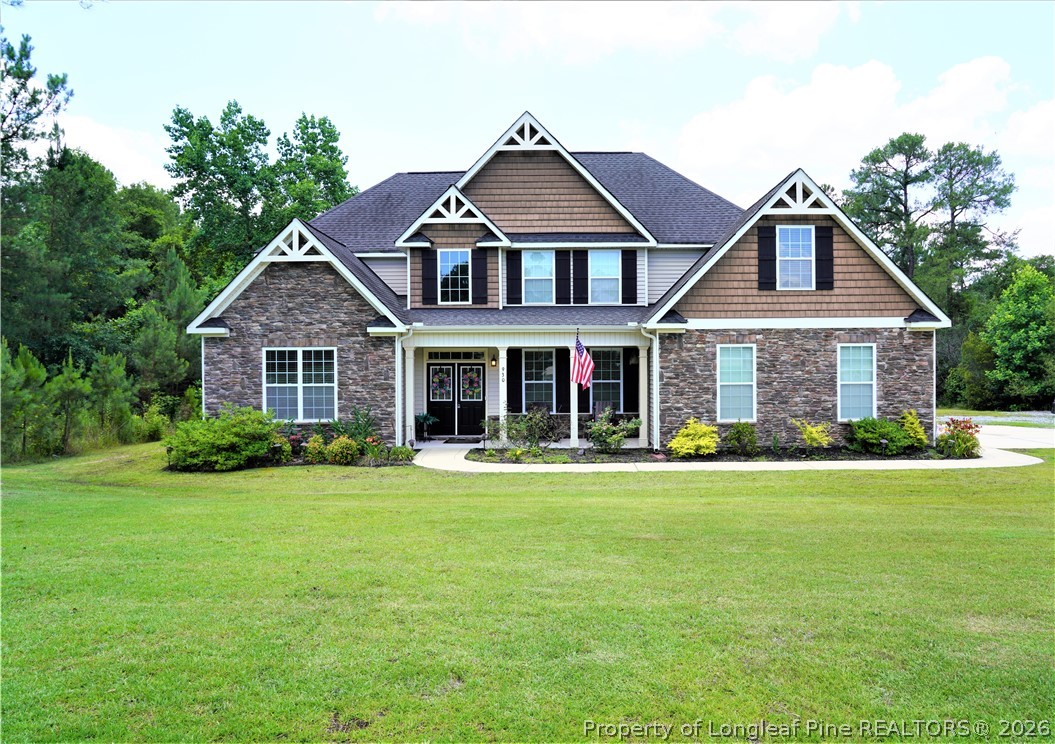 930 Old Vander Road Fayetteville, NC 28312 - Photo 1 of 45 a front view of a house with a yard
