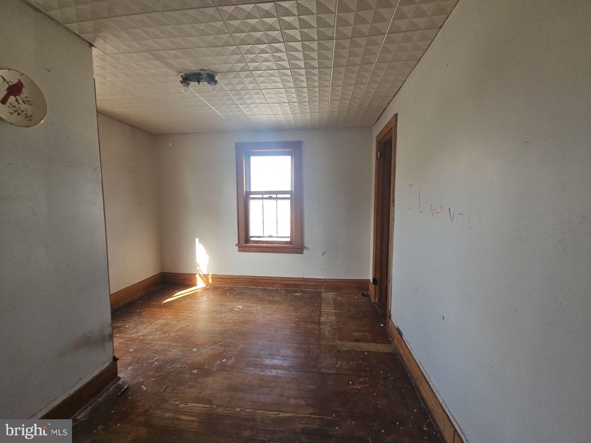 99 North Virginia Avenue Carneys Point, NJ 08069 - Photo 12 of 19 an empty room with windows