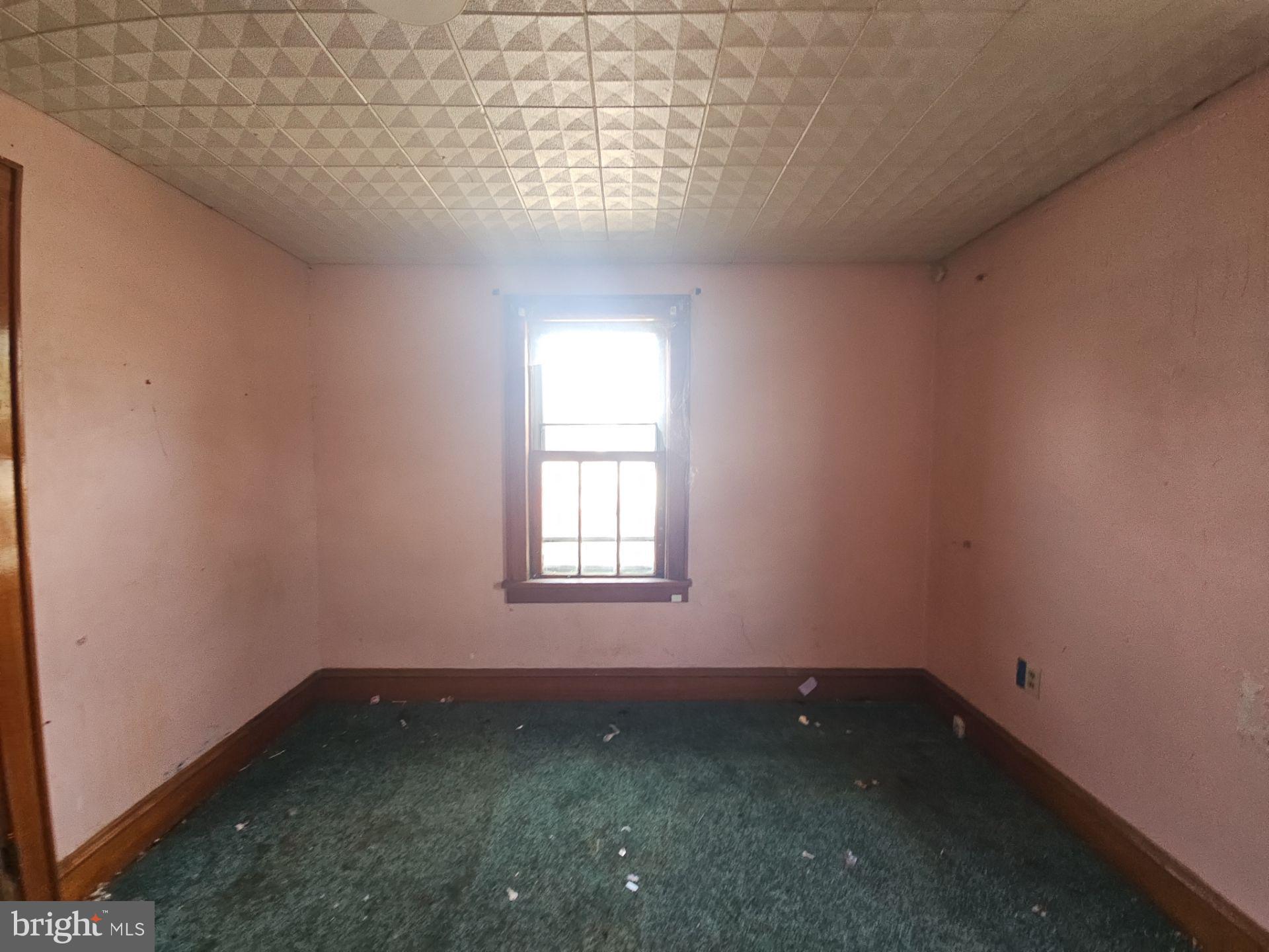 99 North Virginia Avenue Carneys Point, NJ 08069 - Photo 15 of 19 a view of a room that has wooden floor and window in it