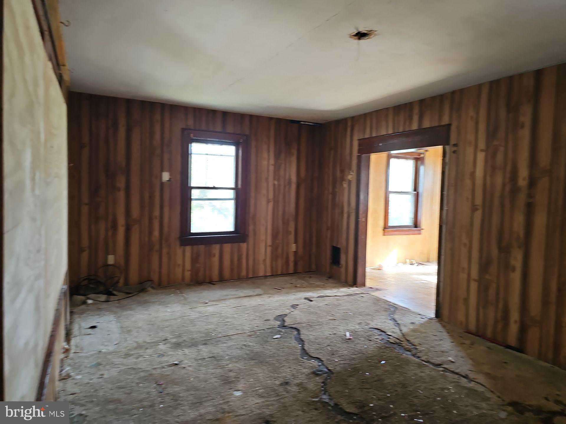 99 North Virginia Avenue Carneys Point, NJ 08069 - Photo 5 of 19 an empty room with windows and closet