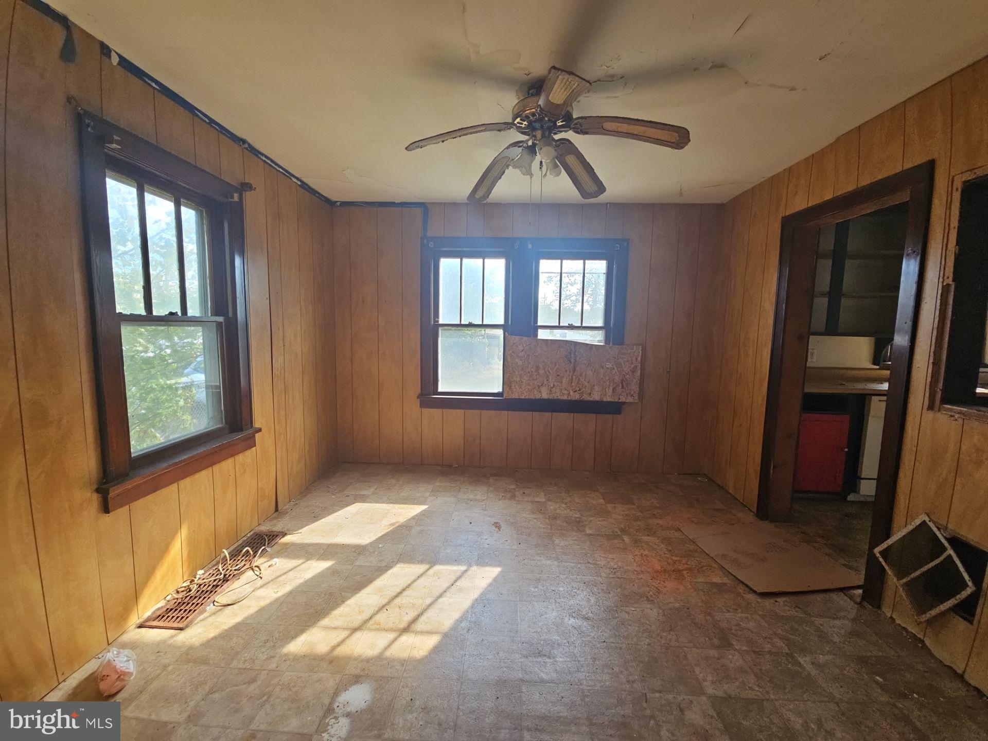 99 North Virginia Avenue Carneys Point, NJ 08069 - Photo 8 of 19 a view of an empty room with a window