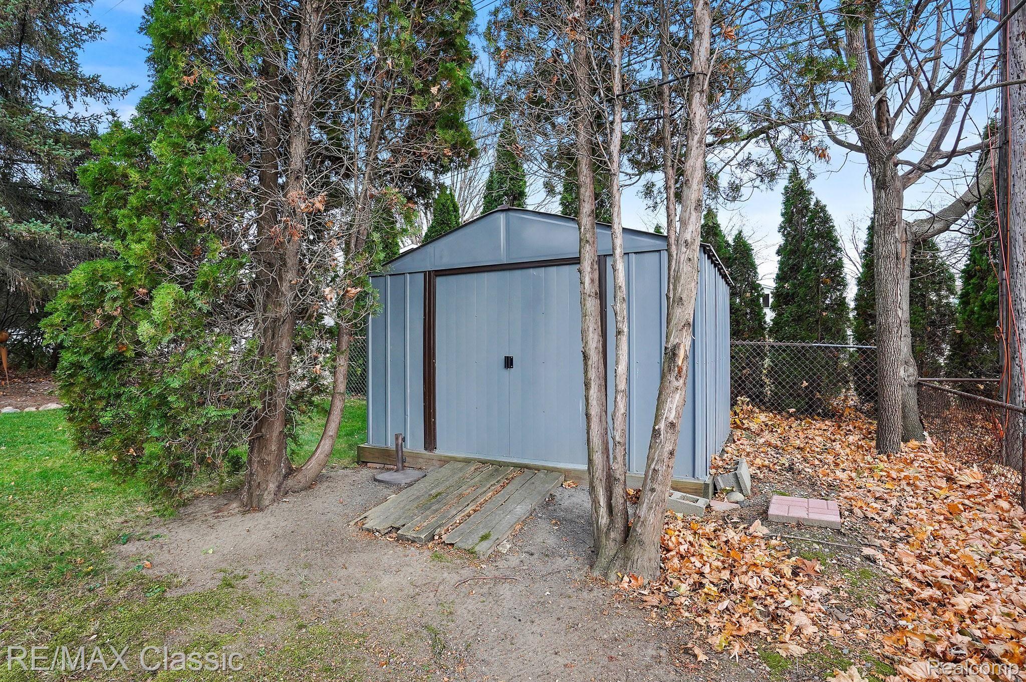 1396 Decker Road Walled Lake, MI 48390 - Photo 6 of 19 Extra Storage in the Shed