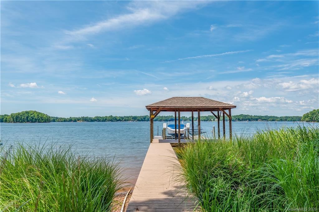 a view of a lake with a garden