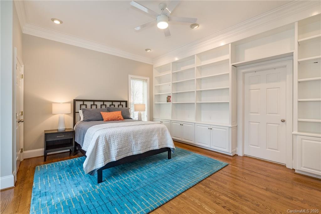 16133 North Point Road Huntersville, NC 28078 - Photo 18 of 42 a bedroom with a bed and closet