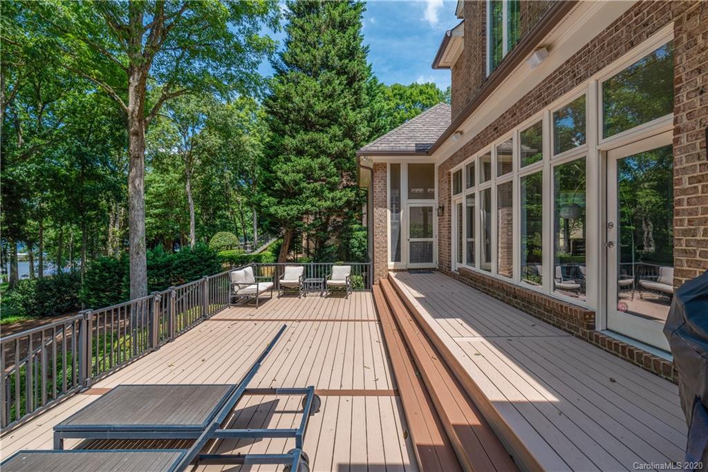 16133 North Point Road Huntersville, NC 28078 - Photo 29 of 42 a view of balcony with wooden floor and fence