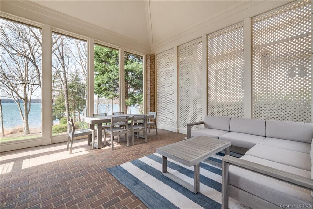 16133 North Point Road Huntersville, NC 28078 - Photo 30 of 42 a living room with furniture large window and a table