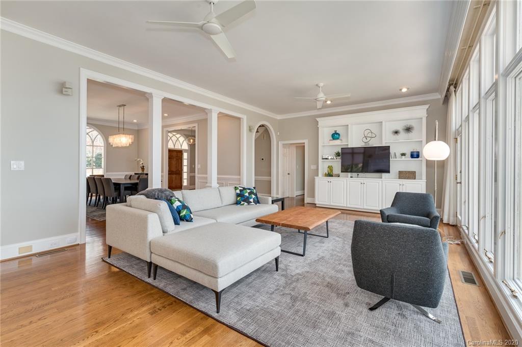 16133 North Point Road Huntersville, NC 28078 - Photo 4 of 42 a living room with furniture and a flat screen tv