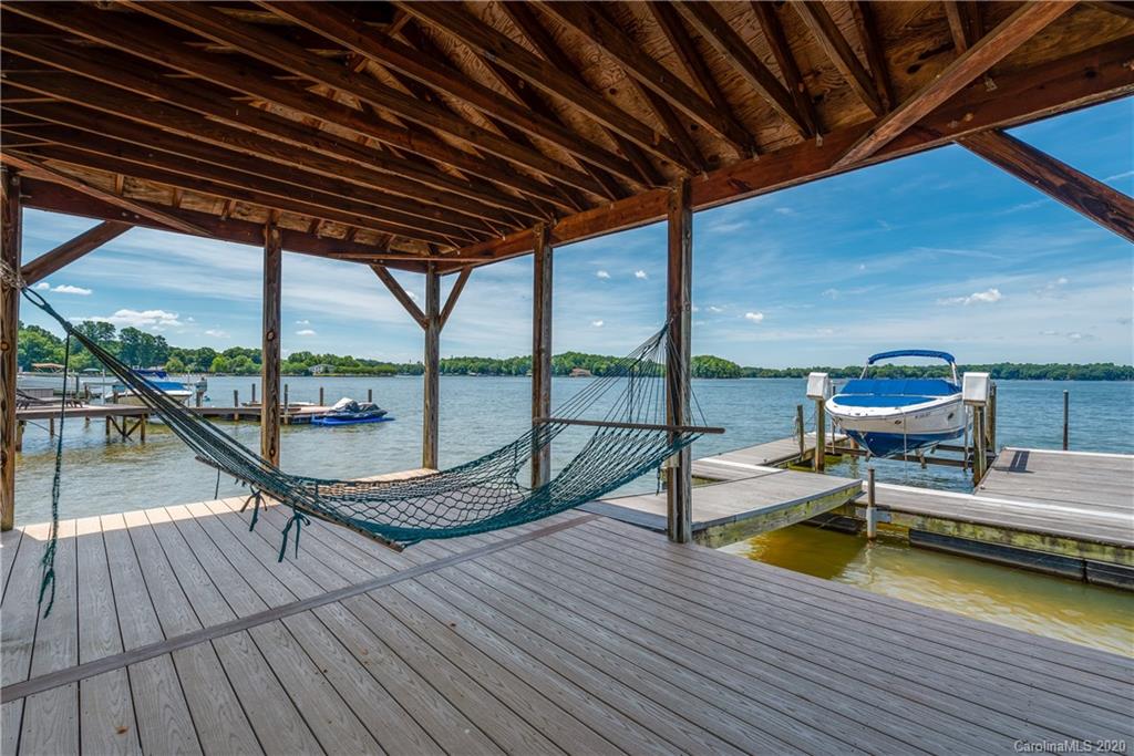 16133 North Point Road Huntersville, NC 28078 - Photo 32 of 42 a view of a swimming pool with lounge chair