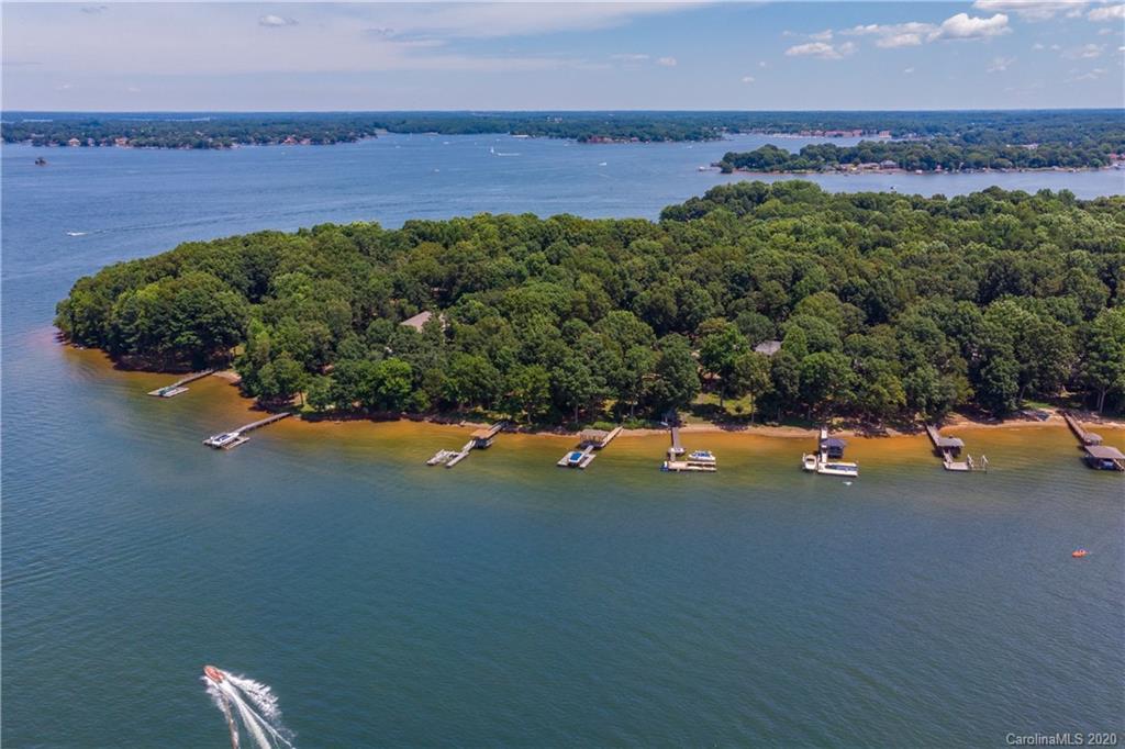 16133 North Point Road Huntersville, NC 28078 - Photo 39 of 42 an aerial view of a houses with a yard and lake view
