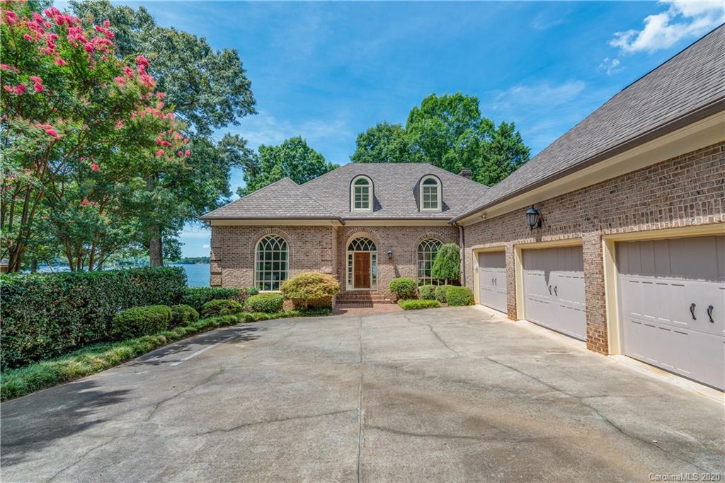 16133 North Point Road Huntersville, NC 28078 - Photo 42 of 42 a front view of a house with garden