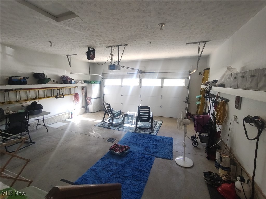 870 Susan Road Ravenna, OH 44266 - Photo 28 of 35 Garage with a garage door opener
