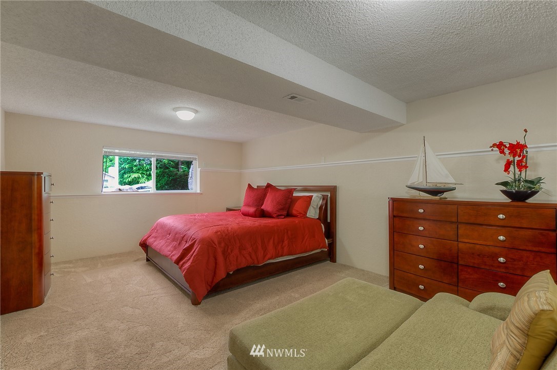2111 Wells Court South Renton, WA 98055 - Photo 20 of 25 a bedroom with a bed and a window
