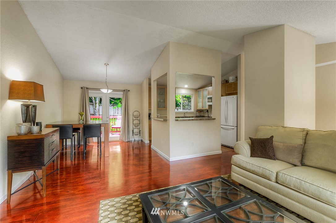 2111 Wells Court South Renton, WA 98055 - Photo 9 of 25 a living room with furniture and a wooden floor