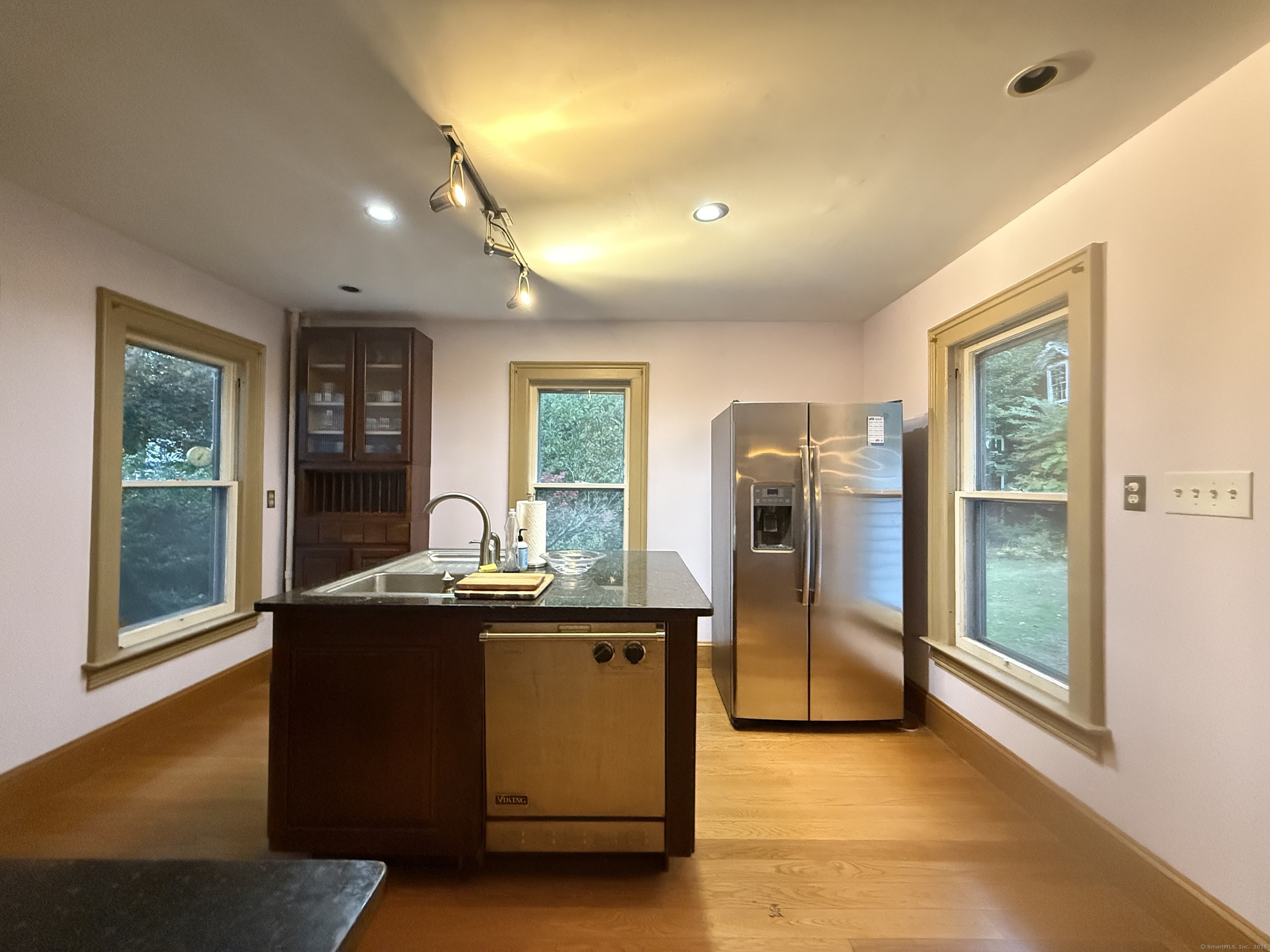 Undisclosed Address Canton, CT 06019 - Photo 6 of 13 a kitchen with stainless steel appliances granite countertop a refrigerator and a sink