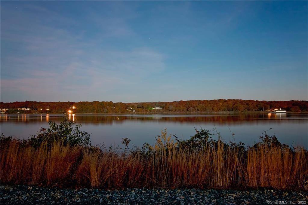 62 Upper Bartlett Road Waterford, CT 06375 - Photo 1 of 1 a view of a lake with a city