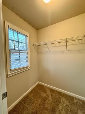 a view of a room with racks on the wall