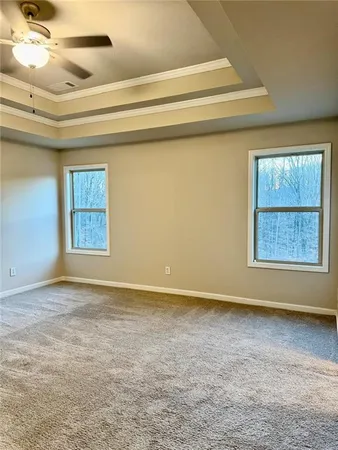 en empty room with windows