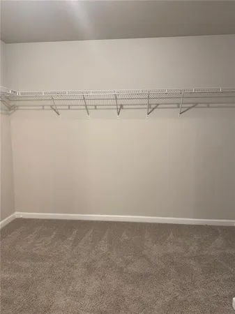 a view of a room with racks on the wall