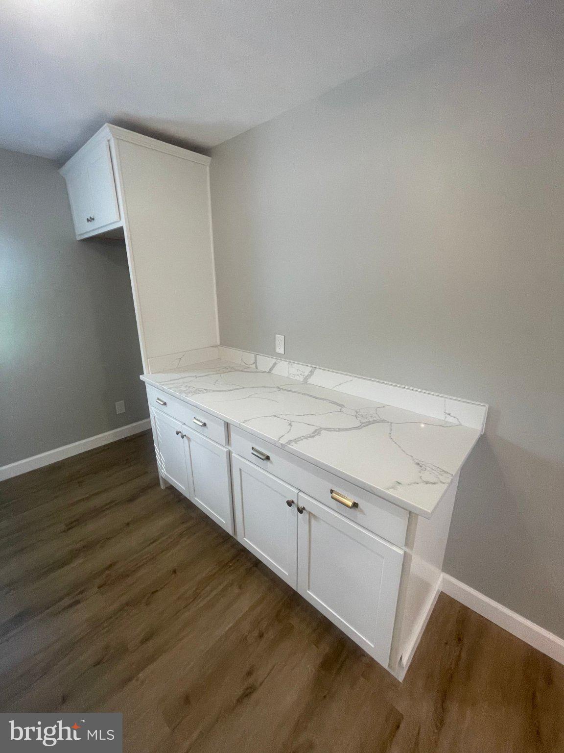 2 Strebor Road, Unit 2 Sparrows Point, MD 21219 - Photo 5 of 18 Sleek white cabinetry with marble top.