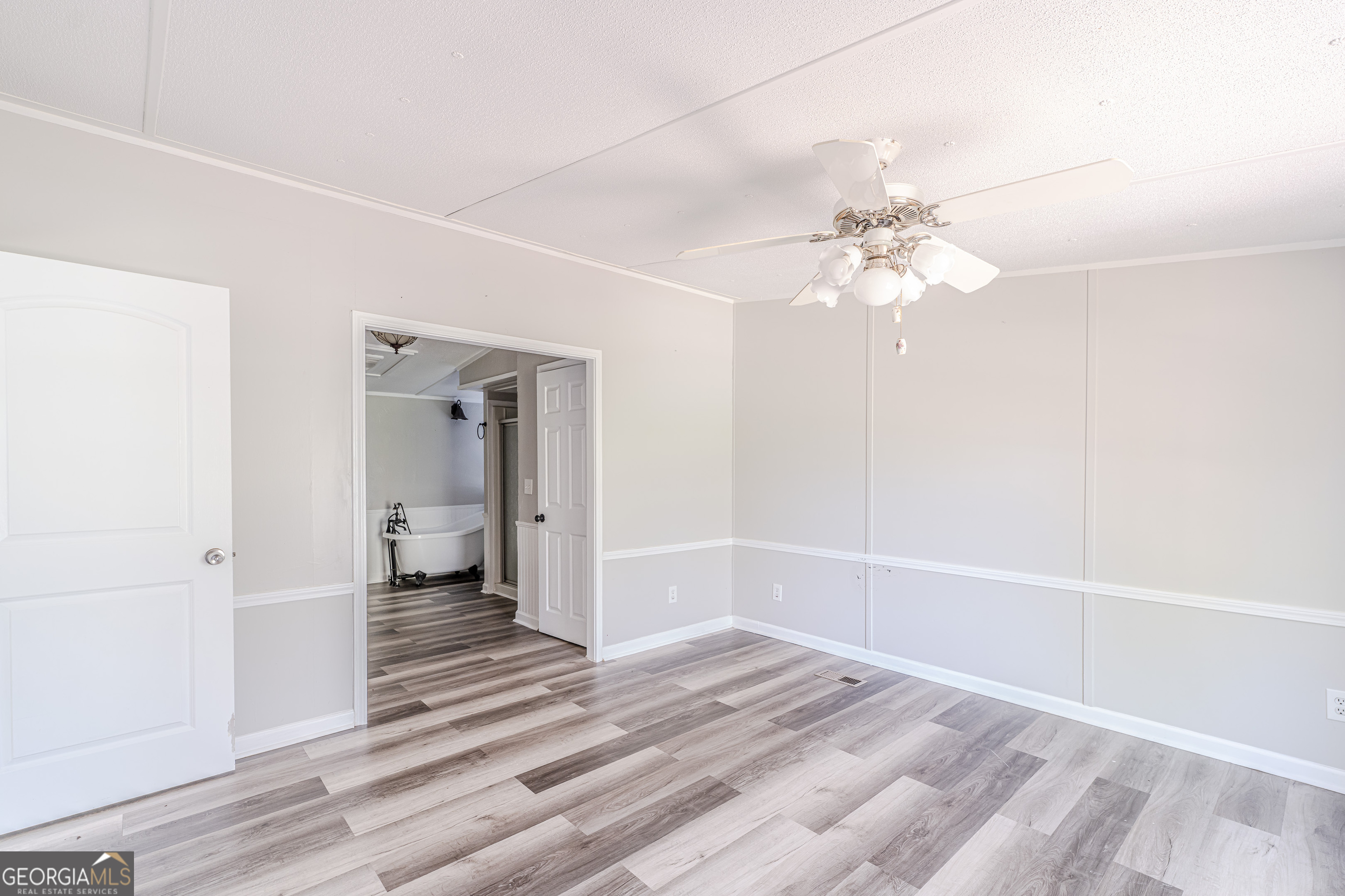71 Kirk Road Northwest White, GA 30184 - Photo 29 of 43 a view of a hallway with a chandelier