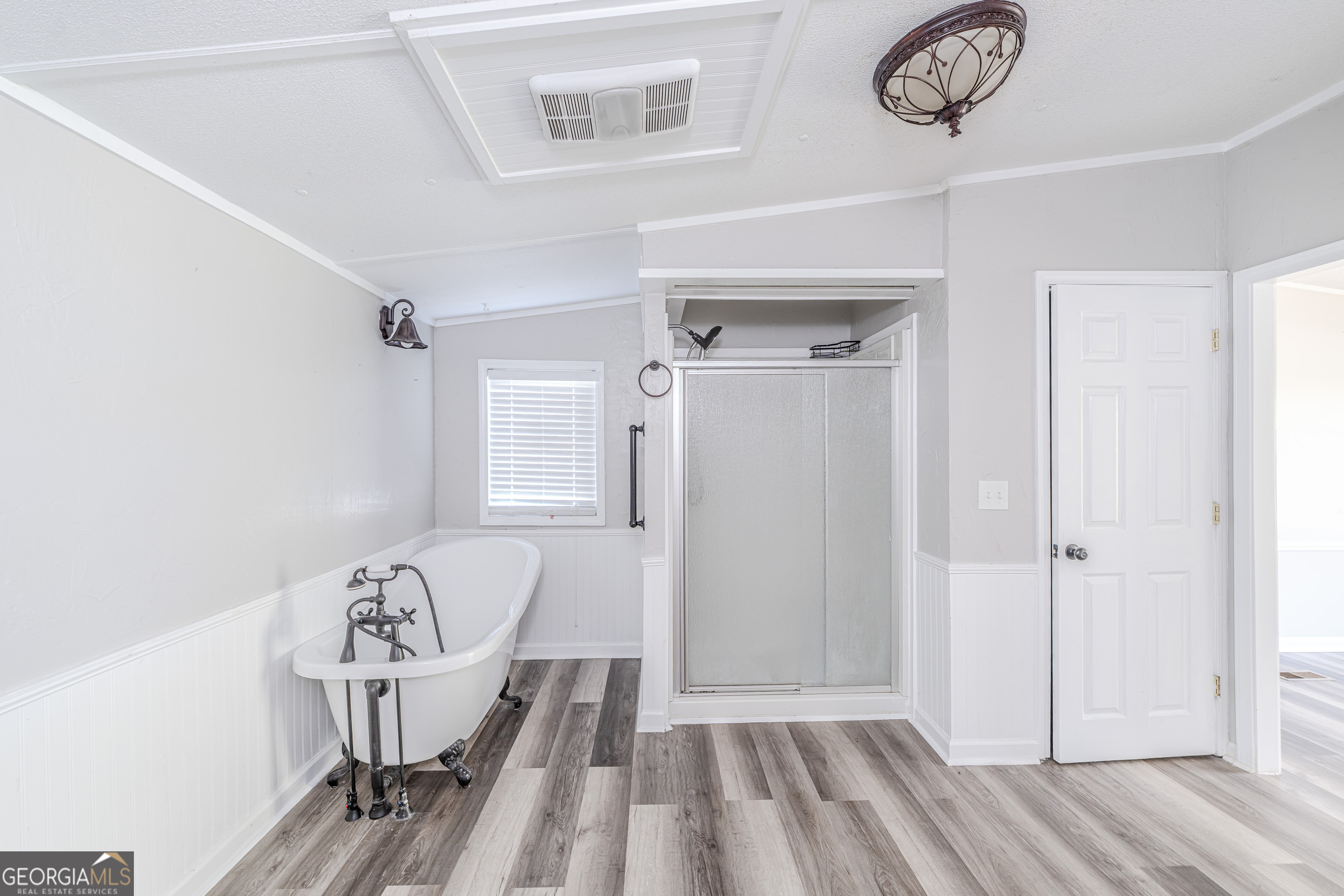 71 Kirk Road Northwest White, GA 30184 - Photo 31 of 43 a view of a room with wooden floor and windows
