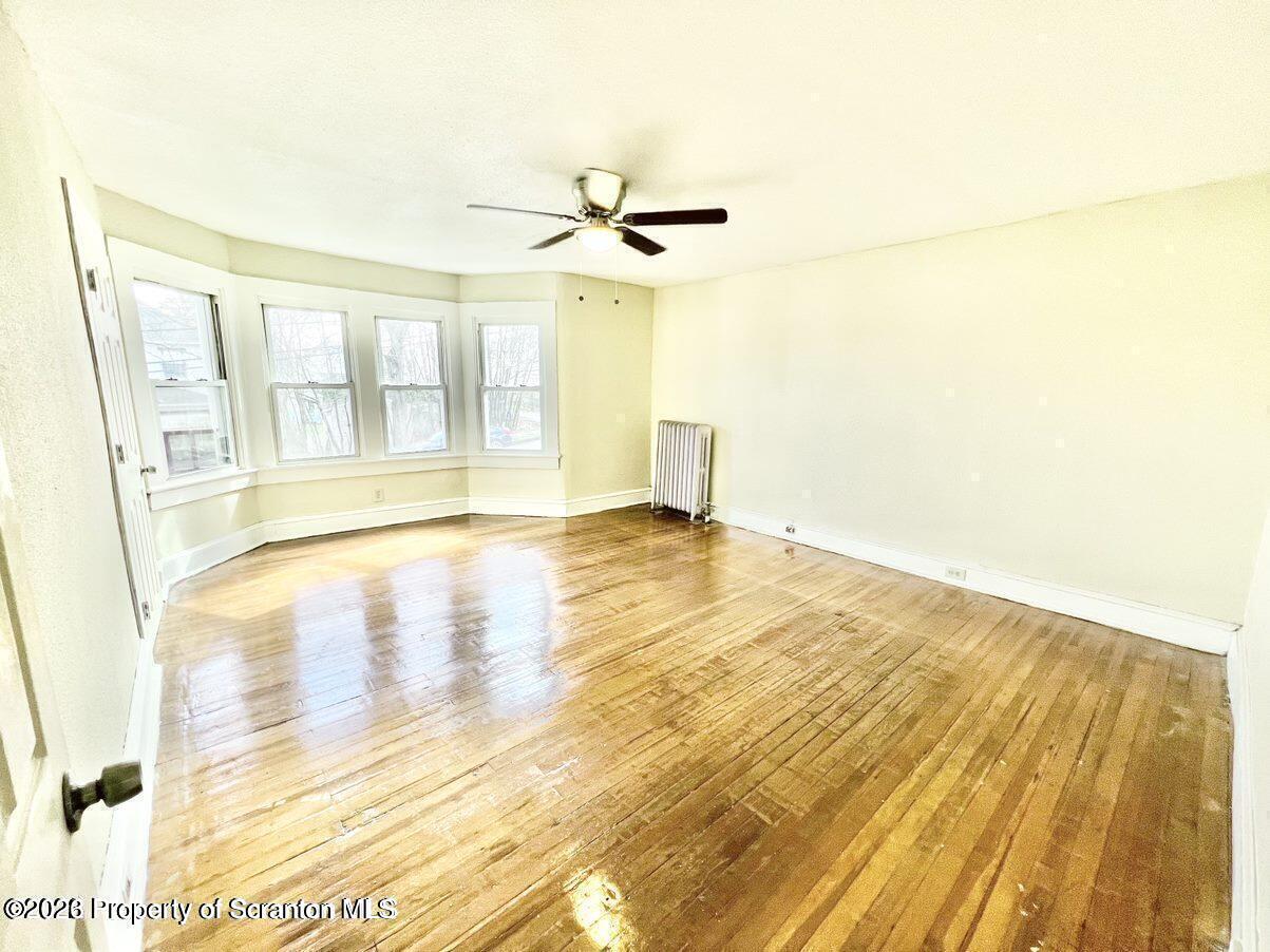 636 Beech Street, Unit 2 Scranton, PA 18505 - Photo 16 of 26 a view of an empty room with glass door