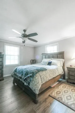 a room with a dresser and a mirror