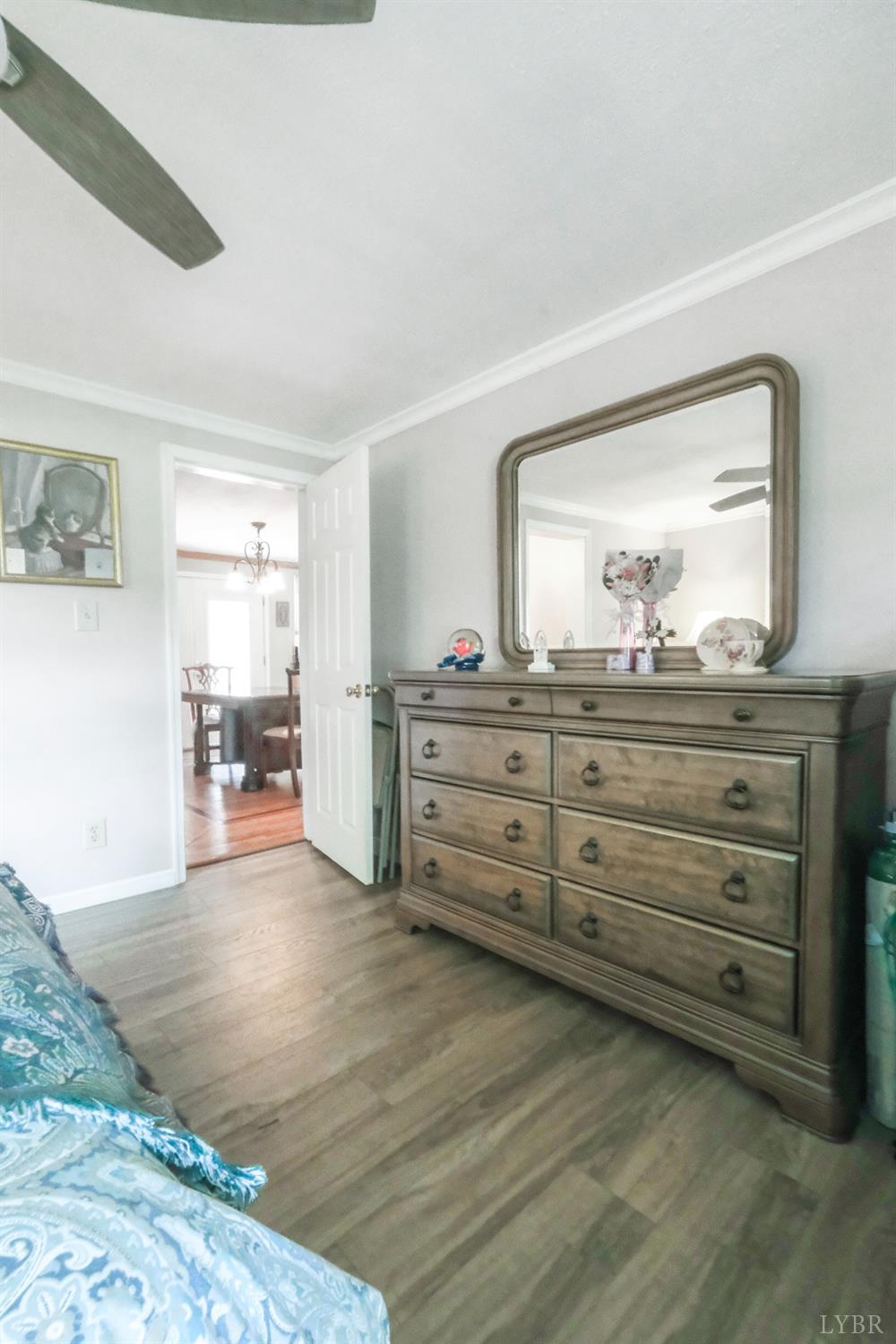 200 Carden Road Phenix, VA 23959 - Photo 18 of 45 a room with a dresser and a mirror