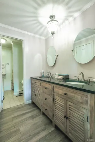 a bathroom with a tub and a sink