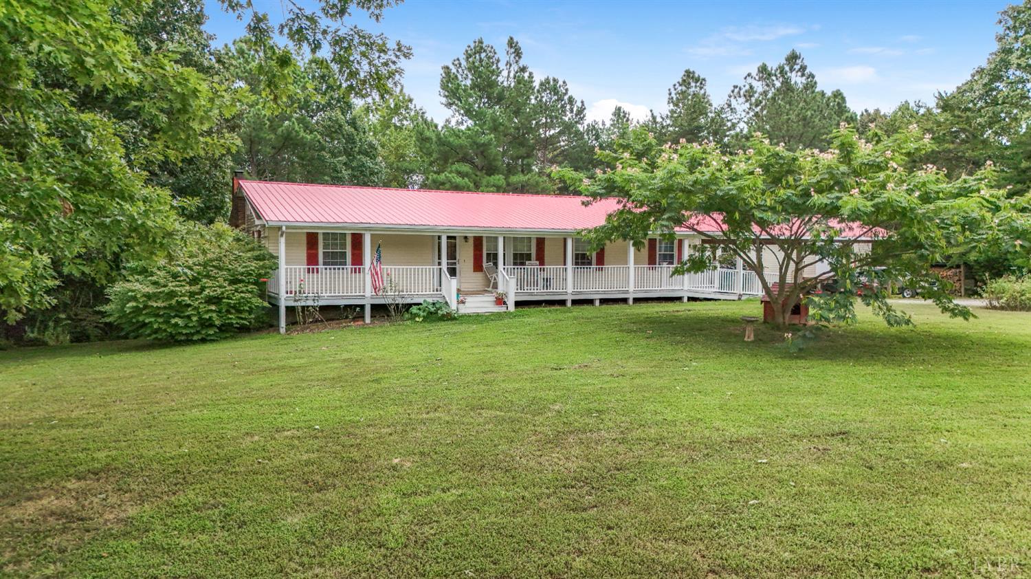 200 Carden Road Phenix, VA 23959 - Photo 2 of 45 a view of a house with a garden