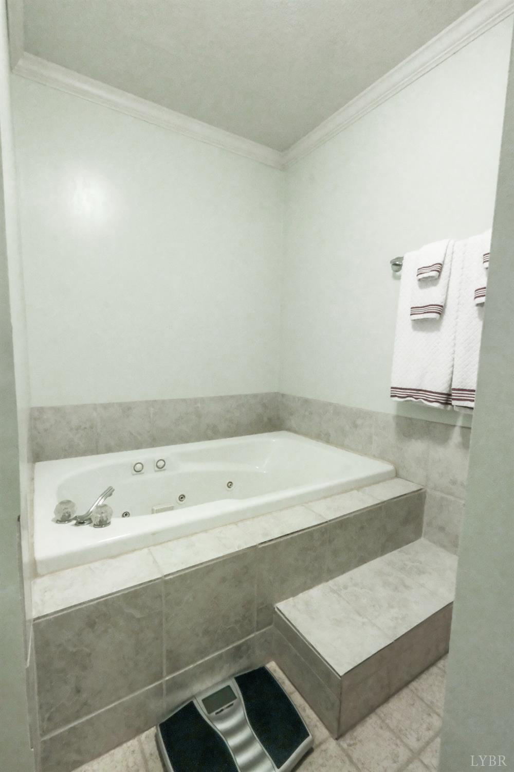 200 Carden Road Phenix, VA 23959 - Photo 21 of 45 a bathroom with a tub and a sink