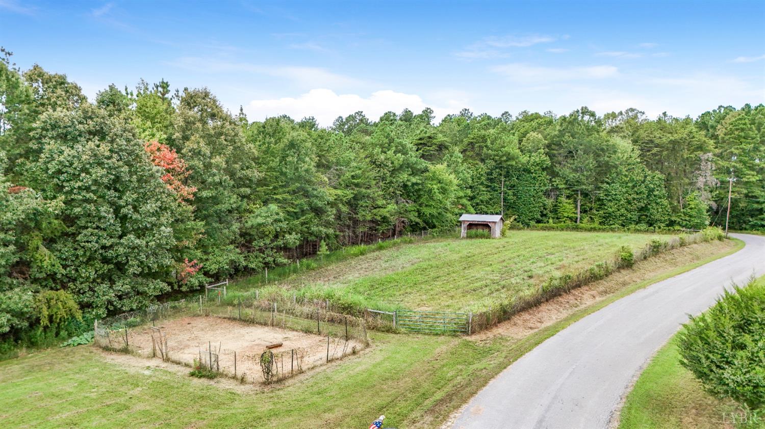 200 Carden Road Phenix, VA 23959 - Photo 38 of 45 a view of a garden with a fountain