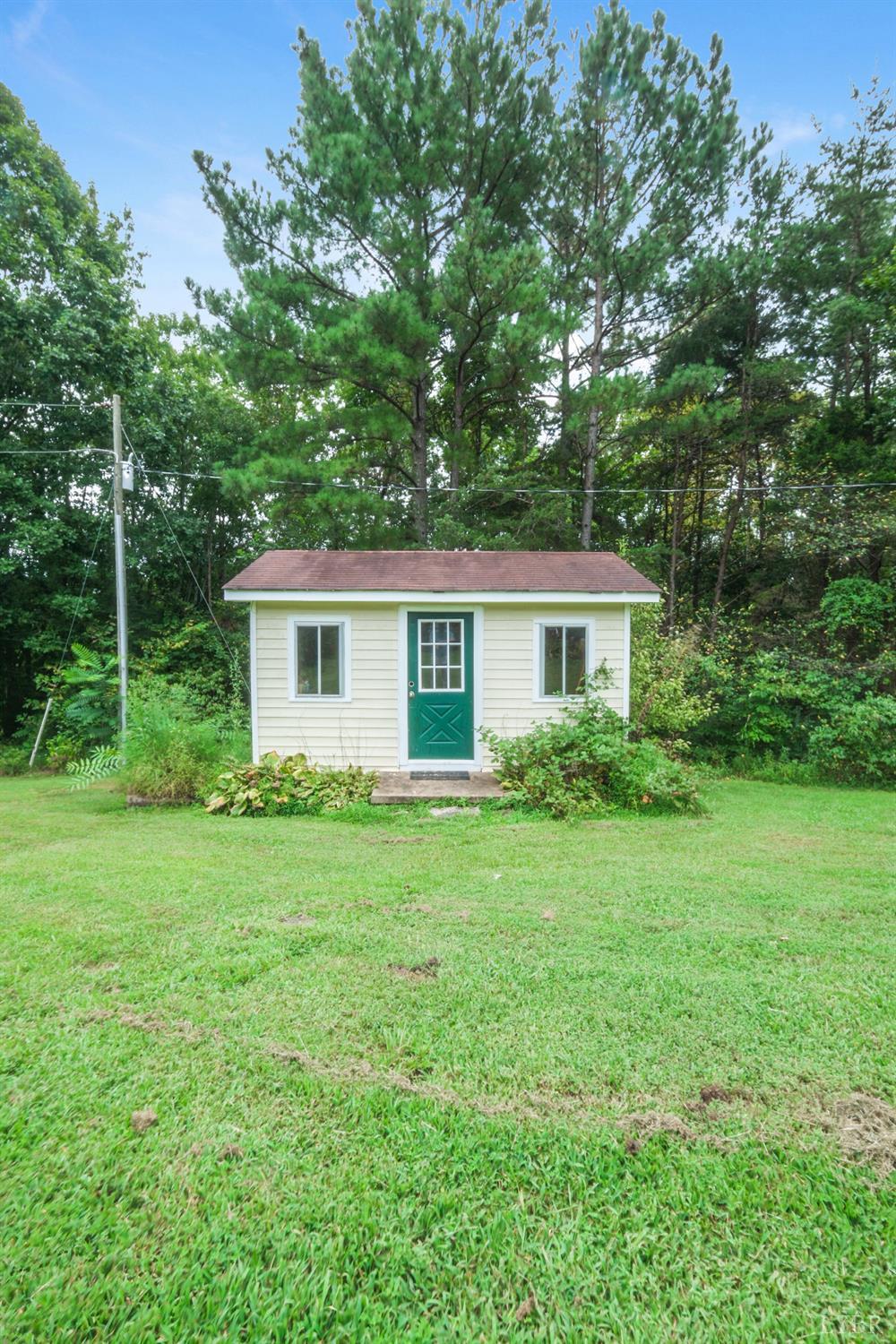 200 Carden Road Phenix, VA 23959 - Photo 4 of 45 a house that is sitting in the grass