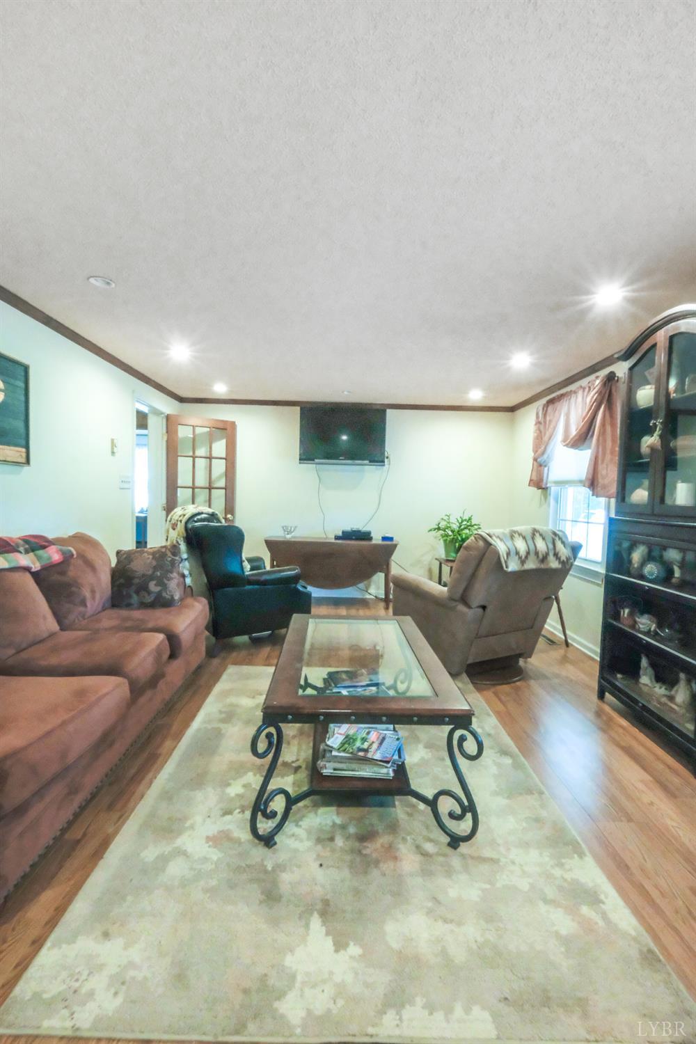 200 Carden Road Phenix, VA 23959 - Photo 8 of 45 a living room with furniture gym equipment and a view of kitchen