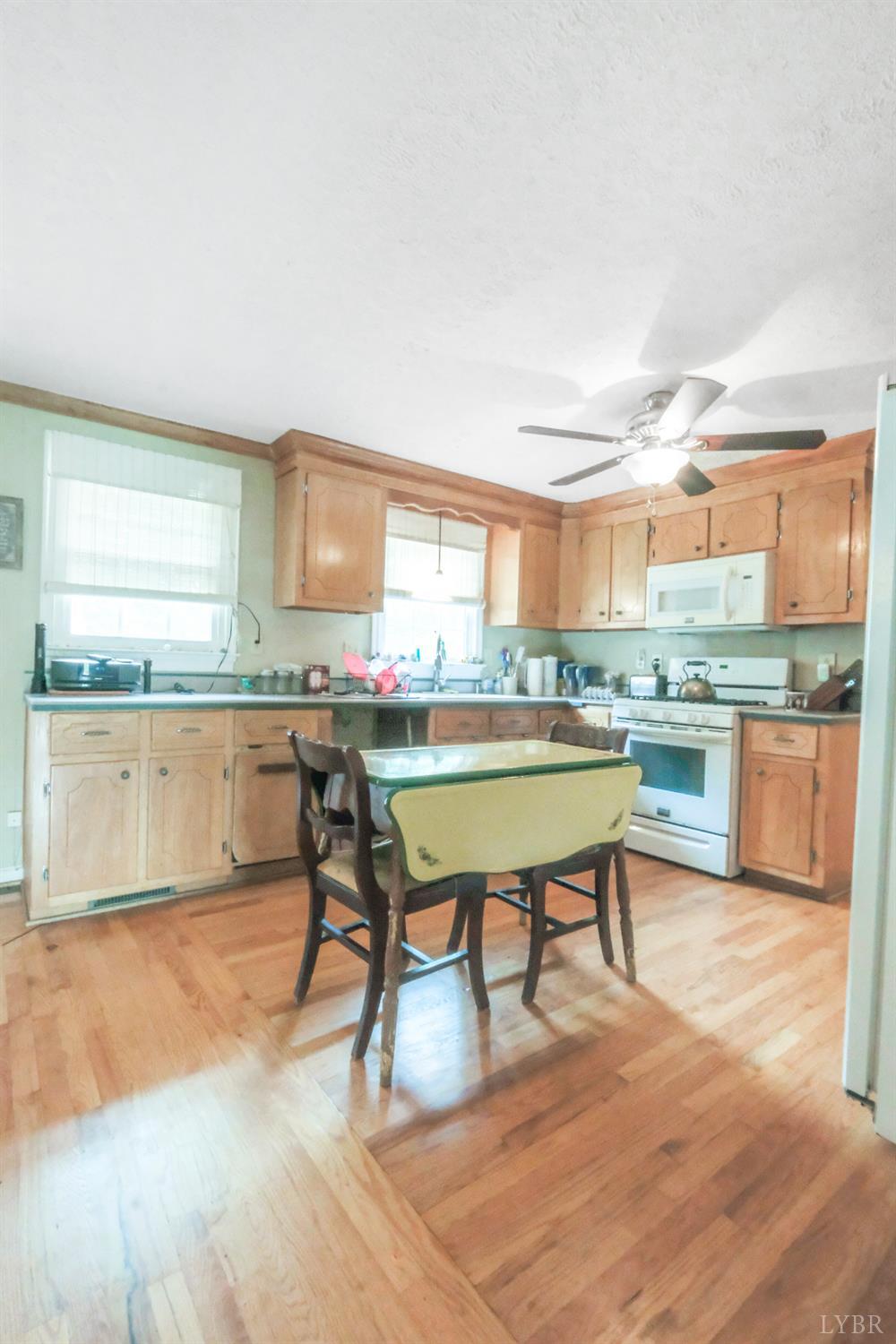 200 Carden Road Phenix, VA 23959 - Photo 9 of 45 a room with stainless steel appliances kitchen island granite countertop furniture and a kitchen view