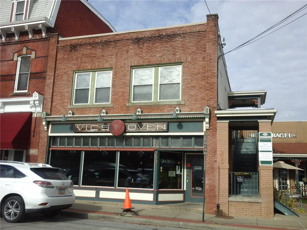 210 Bridge Street, Unit A Bridgewater, PA 15009 - Photo 1 of 5 a view of a building with car parked